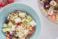 Refreshing Pearl Couscous Salad with Feta, Cucumber, and Bursting Cherry Tomatoes