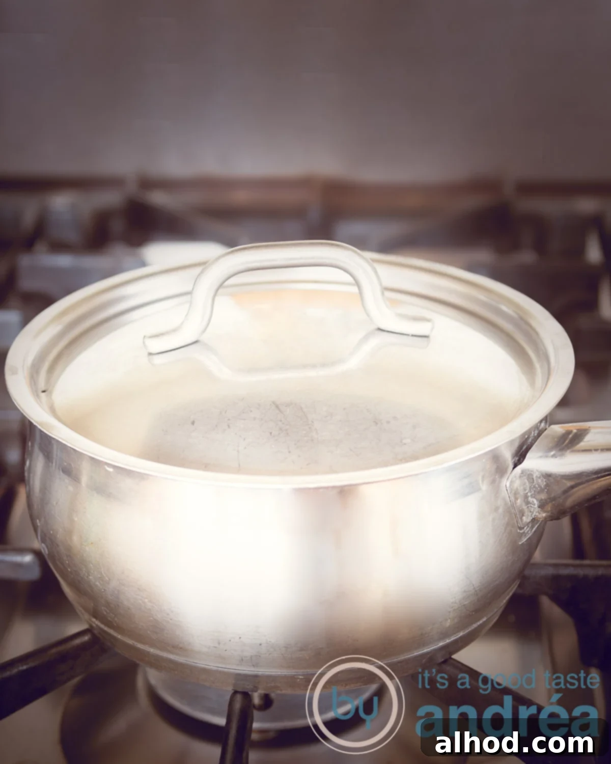 Perfect Eggs From Runny to Firm 4 A saucepan with a lid on, demonstrating the off-heat cooking method for eggs.