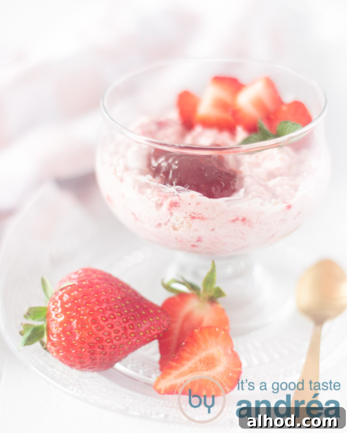 Creamy Strawberry Oat Smoothie Bowl 5 a glass of Strawberry mousse with oatmeal in the sand