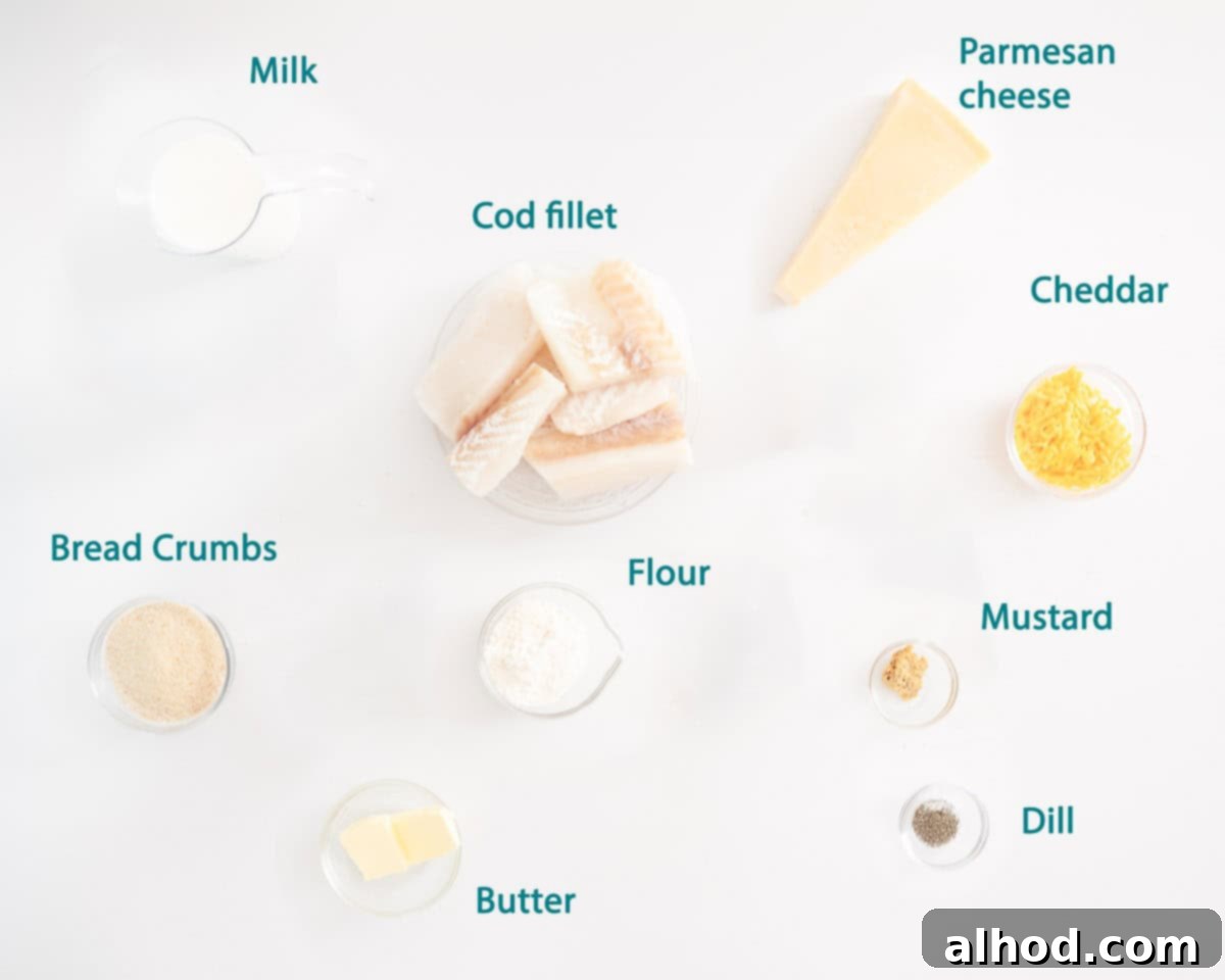 Effortless Cheesy Cod Bake 3 Individually labeled ingredients for Easy Cheesy Baked Cod Recipe, laid out neatly on a white background, including cod fillets, butter, flour, milk, mustard, Parmesan, dill, cheddar, and breadcrumbs.