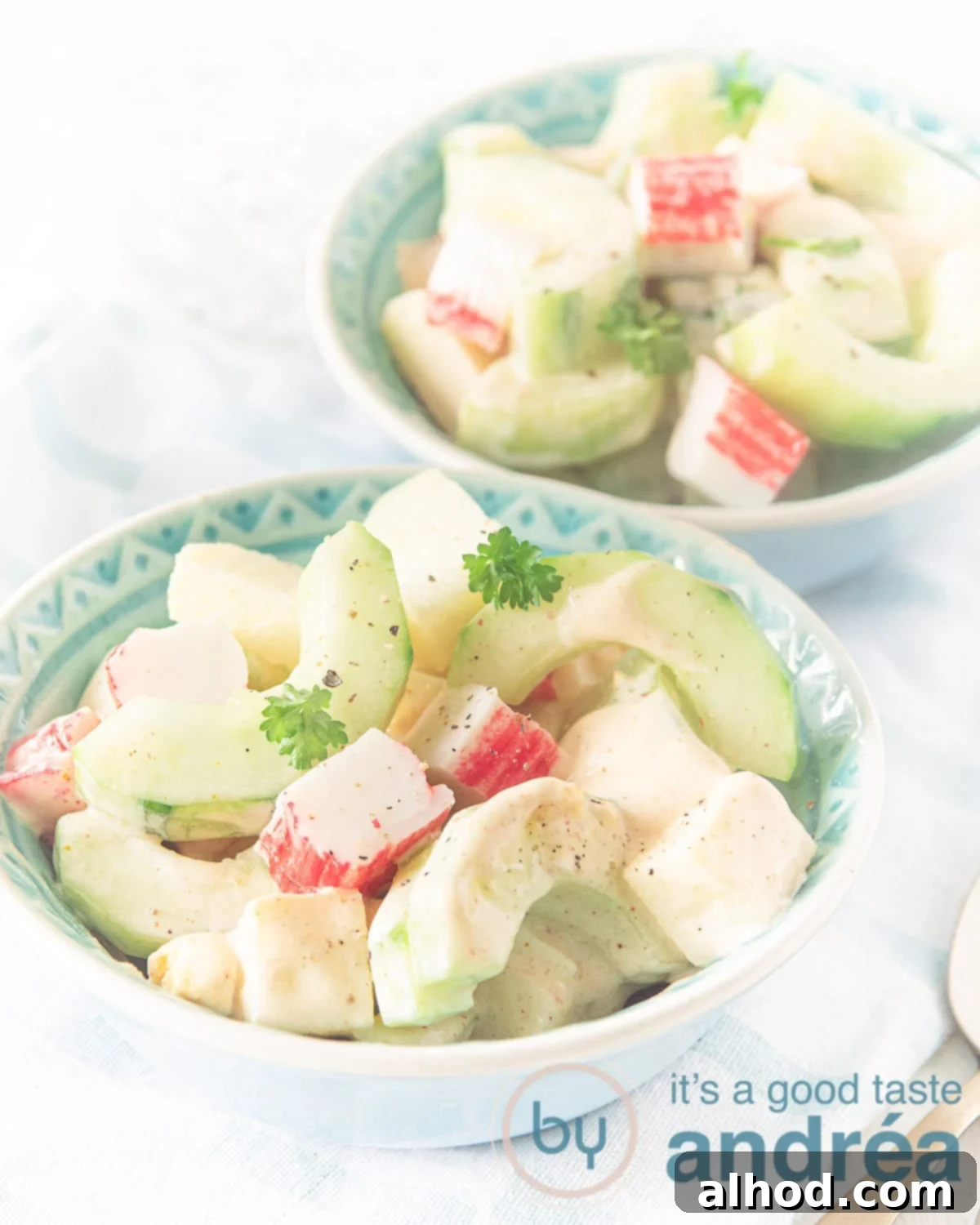 Bourbon-Infused Surimi Salad Recipe 3 a bowl with surimi salad with homemade cocktail sauce