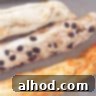 Three strands of dough in different flavors on a gray background