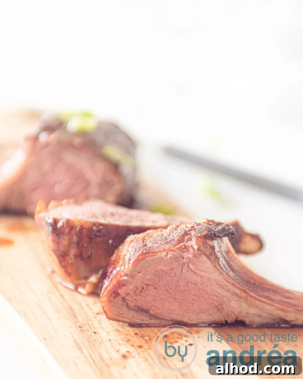 Irresistible Asian Lamb Rack Marinade 9 A wooden plate with lamb chops