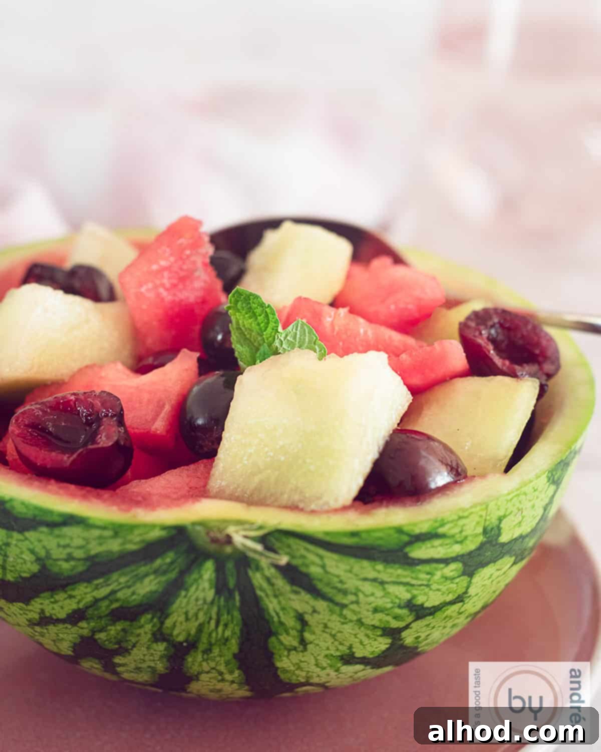 Watermelon Oasis Fruit Basket 3 Half a bowl of watermelon filled with fresh fruit
