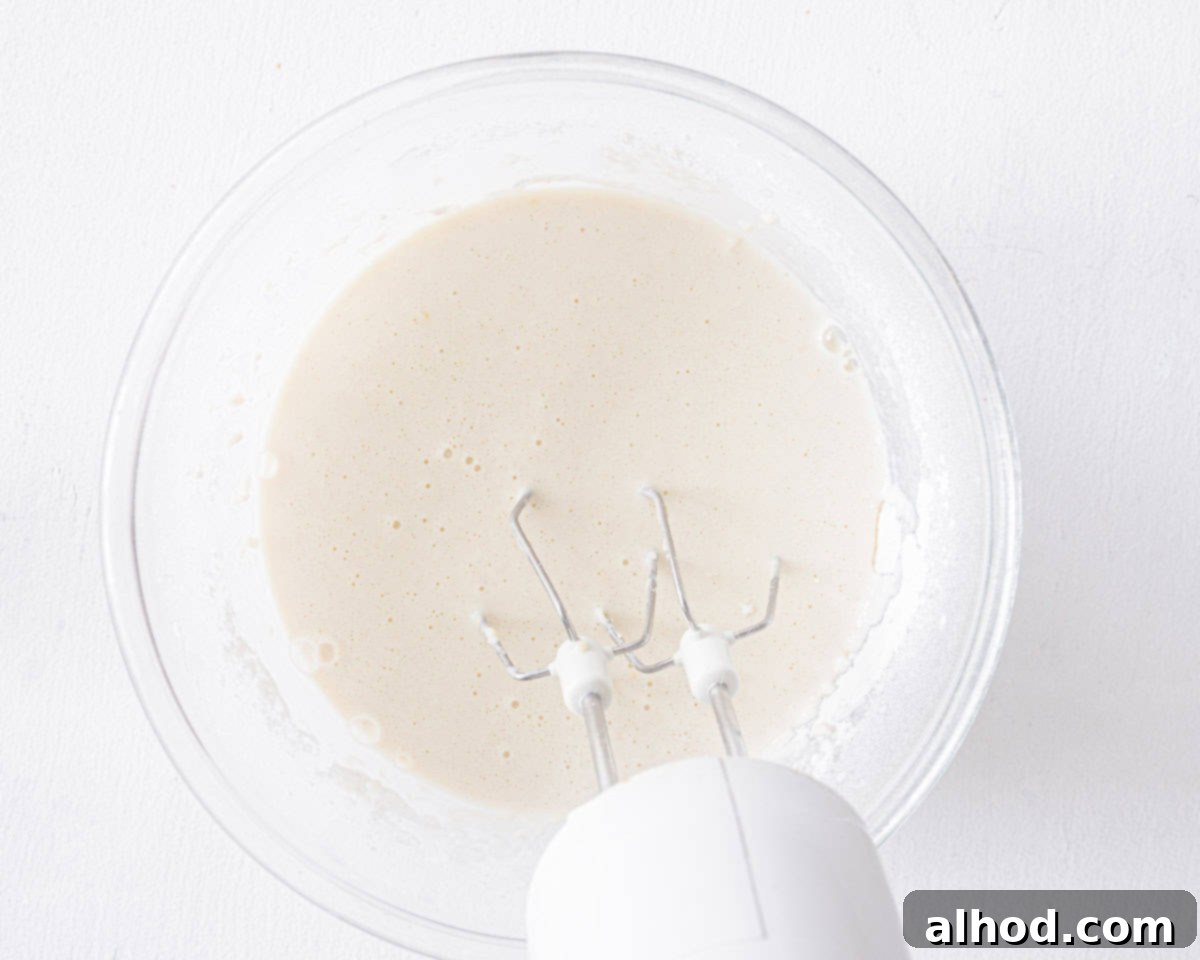 Sweetheart Pancakes with Strawberry Delight 5 Pancake batter mixed with a mixer