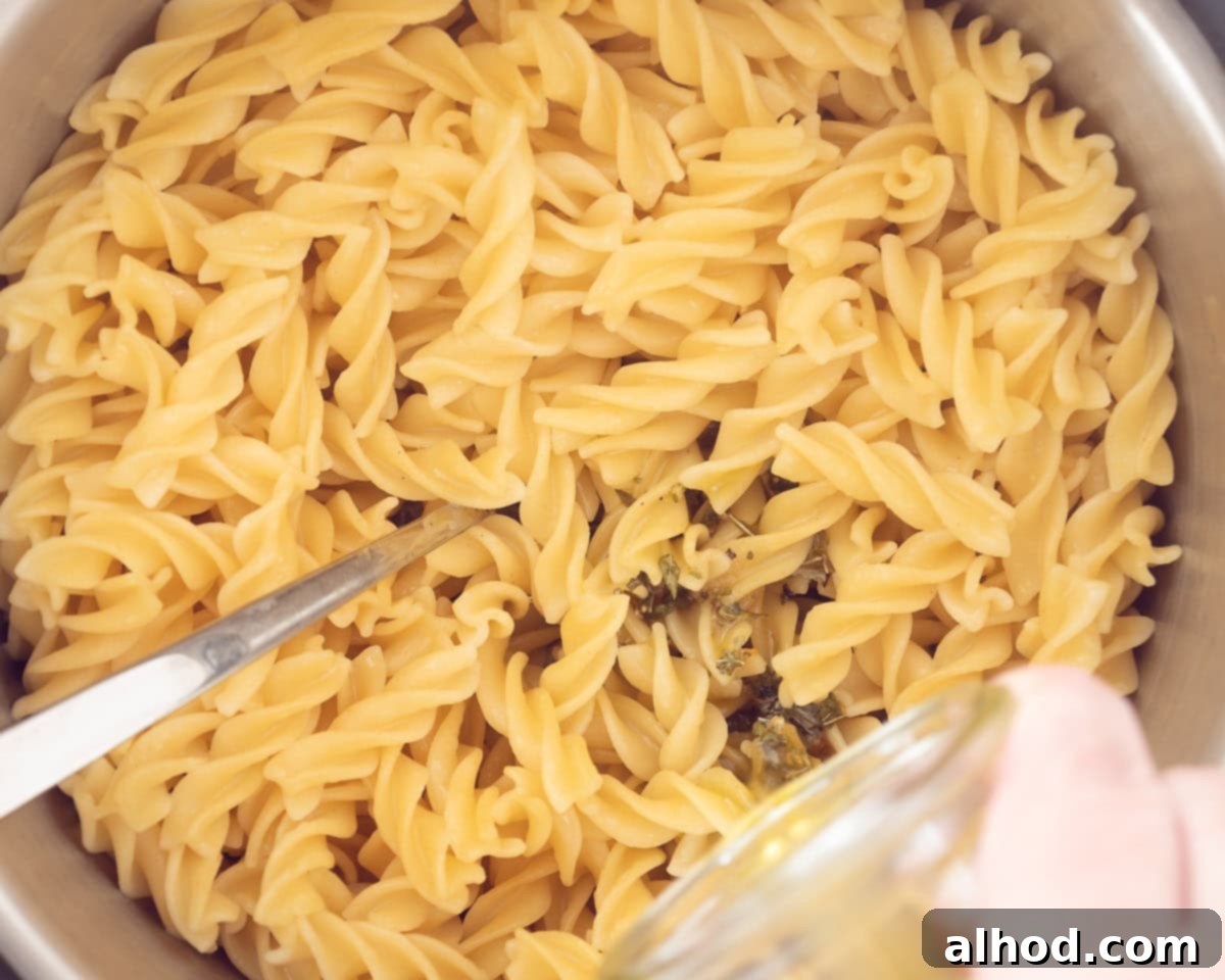Zesty Italian Veggie Pasta Salad 6 Add Italian dressing to the cooked fussili