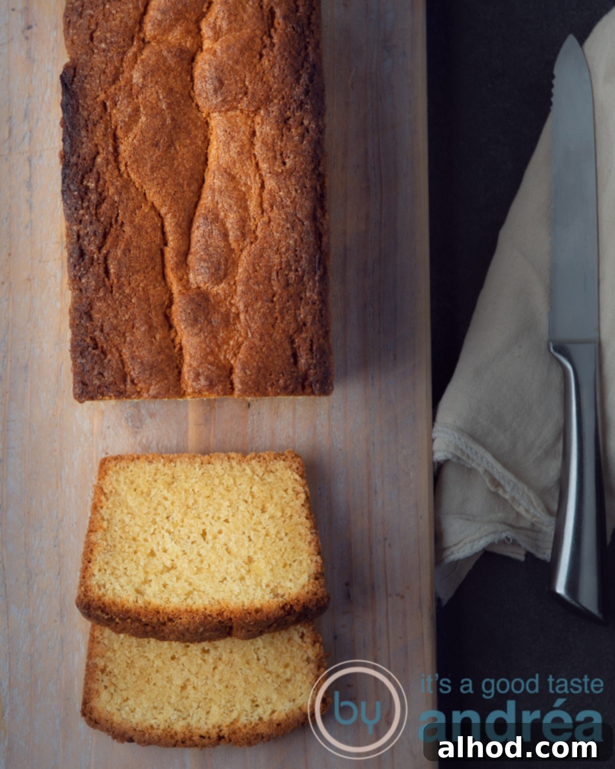 Golden Dutch Pound Cake 5 A simple yet elegant easy pound cake, beautifully golden-brown and ready to be served, placed on a wooden surface.