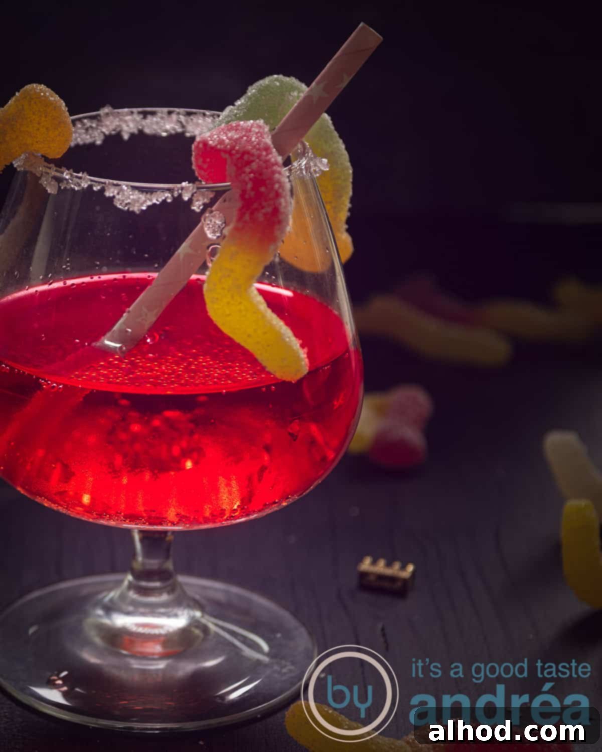 Wicked Passoa Brew 2 Part of a Passoa Halloween Cocktail, worms climbing up. A dark background