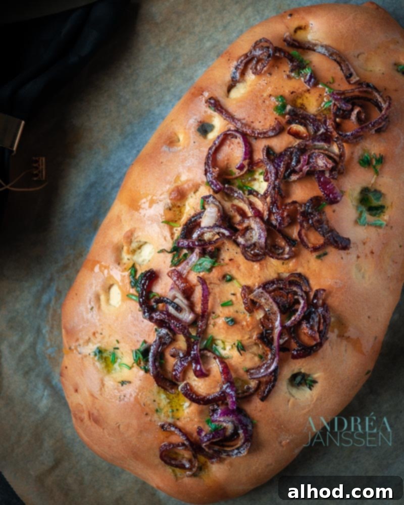 Focaccia with Caramelized Red Onion and Garlic Butter - A delightful homemade Italian bread recipe with savory toppings