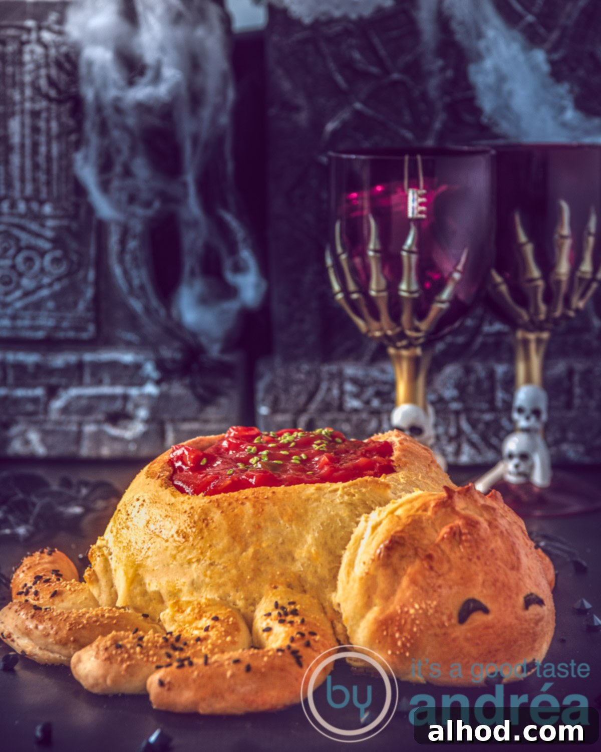 A beautifully crafted bread bowl shaped like a spider, filled with vibrant taco sauce, set against a dark, moody Halloween background. Perfect for a spooky party.