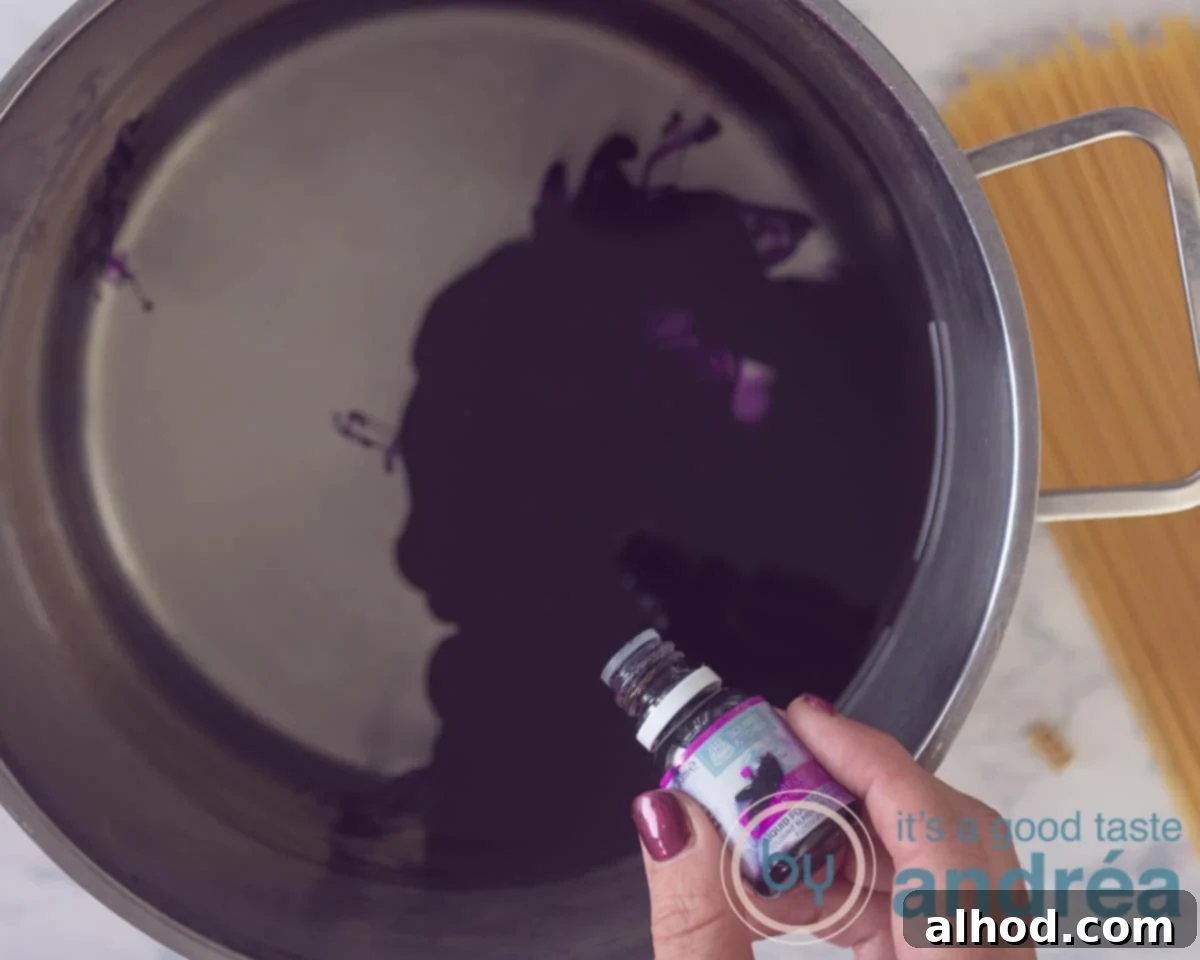 Witch's Cauldron Bolognese 7 Add purple food color to the boiling water for spaghetti.