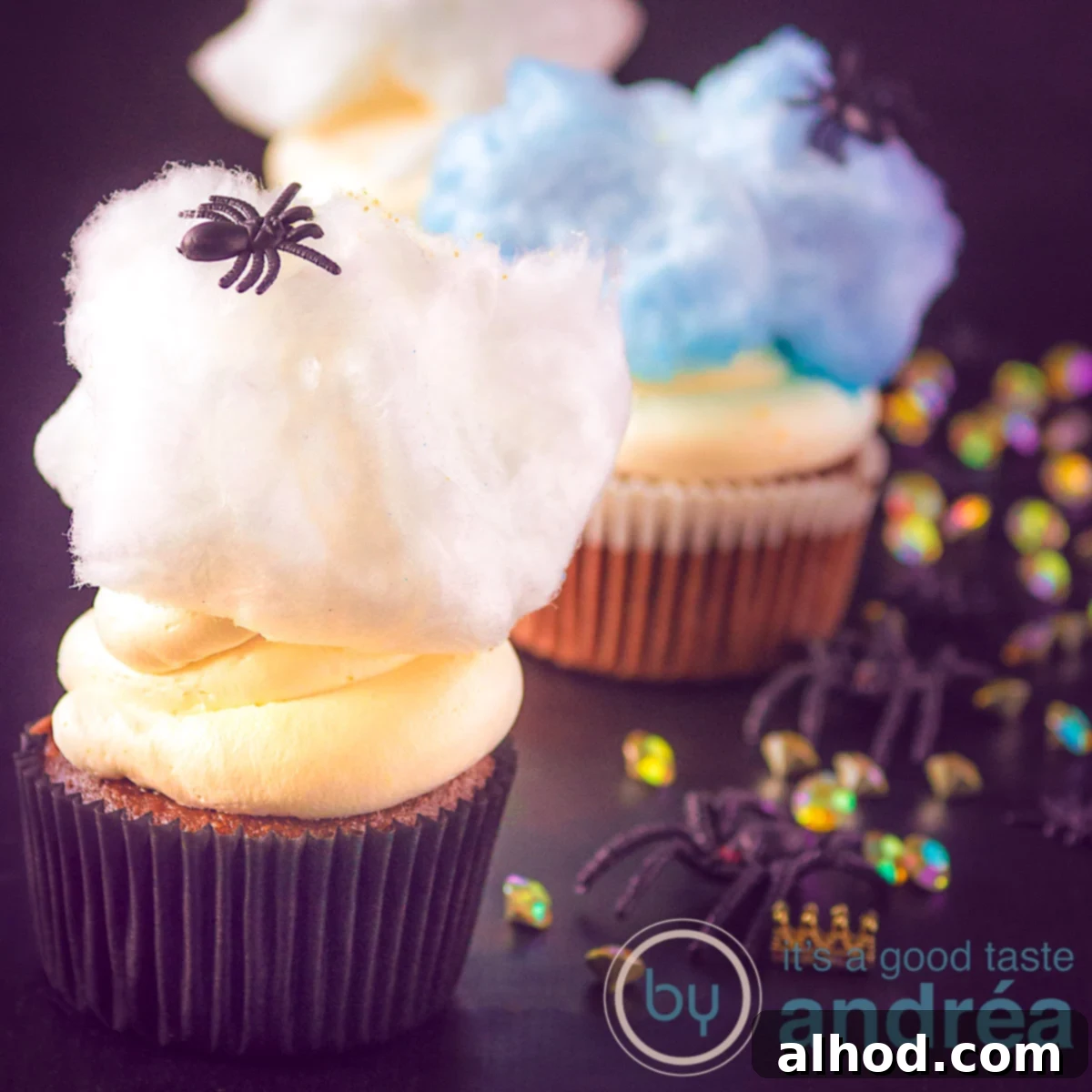 Ghastly Good Mascarpone Cupcakes 4 Spider cupcakes with mascarpone frosting and cotton candy on a black background