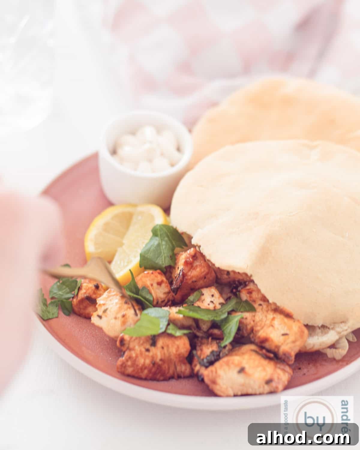 Flavorful Chicken Souvlaki 2 Flavorful chicken souvlaki served in pita with tzatziki and fresh lettuce