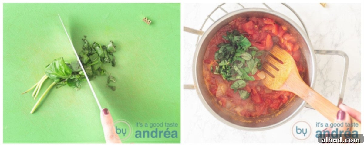 Garden Fresh Tomato Soup 6 A person's hands finely chopping fresh green basil leaves on a wooden cutting board, preparing to add them to the stewed tomato mixture in a pan.
