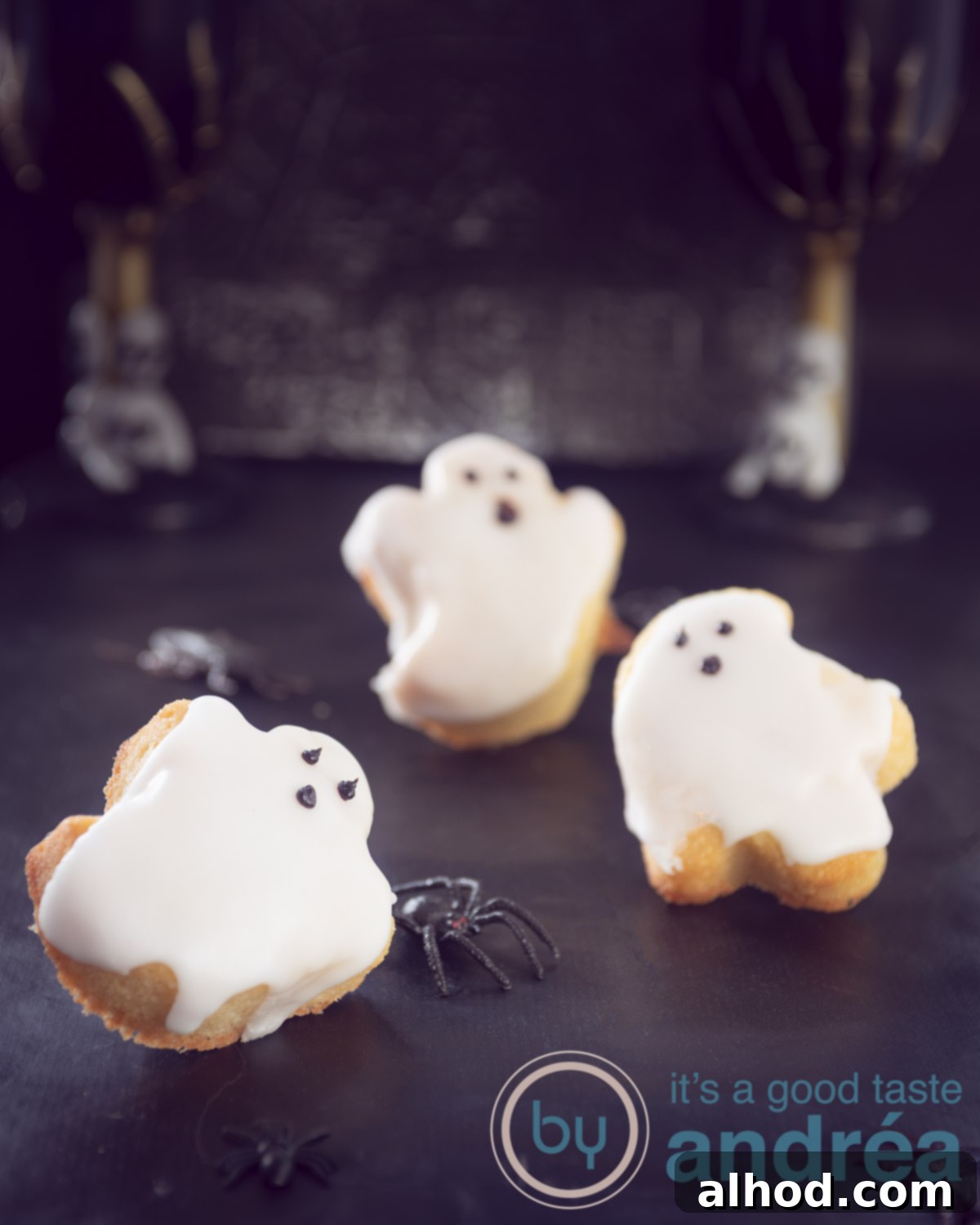 Grinning Ghost Halloween Cupcakes 3 Delicious Halloween ghost cupcakes decorated with chocolate faces
