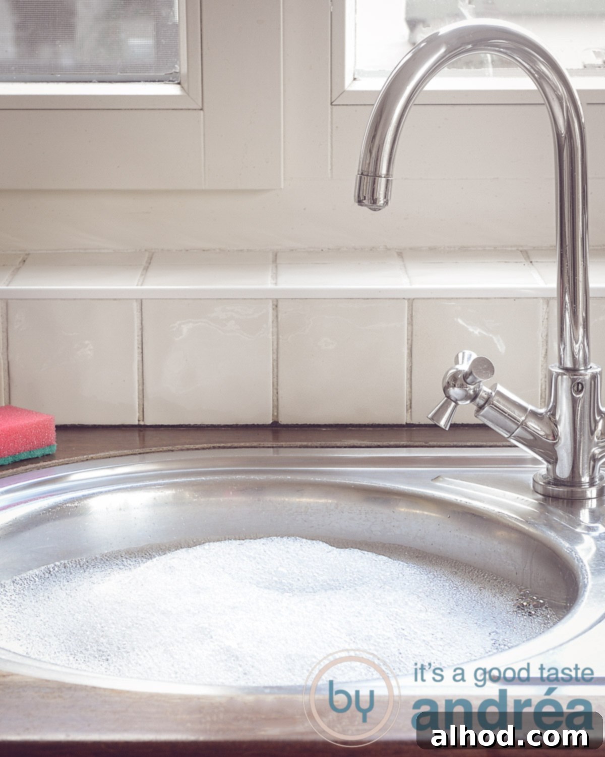 Sparkling Dishes, Zero Stress 3 A sink filled with hot water and soap bubbles.