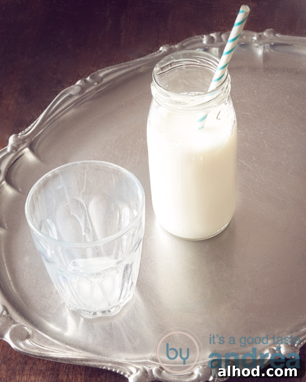Sparkling Dishes, Zero Stress 4 A bottle of milk and an empty glass with milk residue on a silver plate