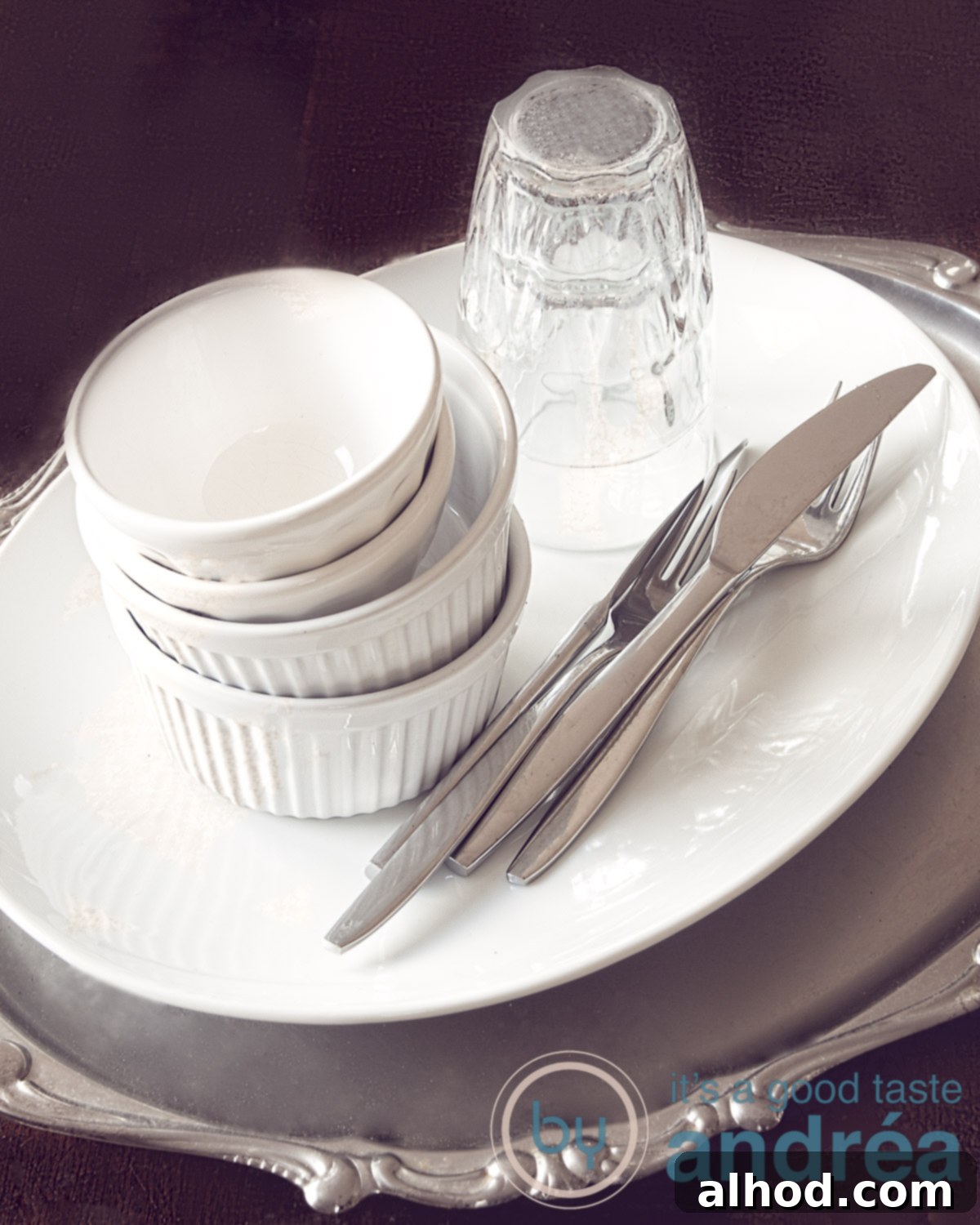 Sparkling Dishes, Zero Stress 5 A staple of plates, bowls, cutlery and glasses on a silver tray