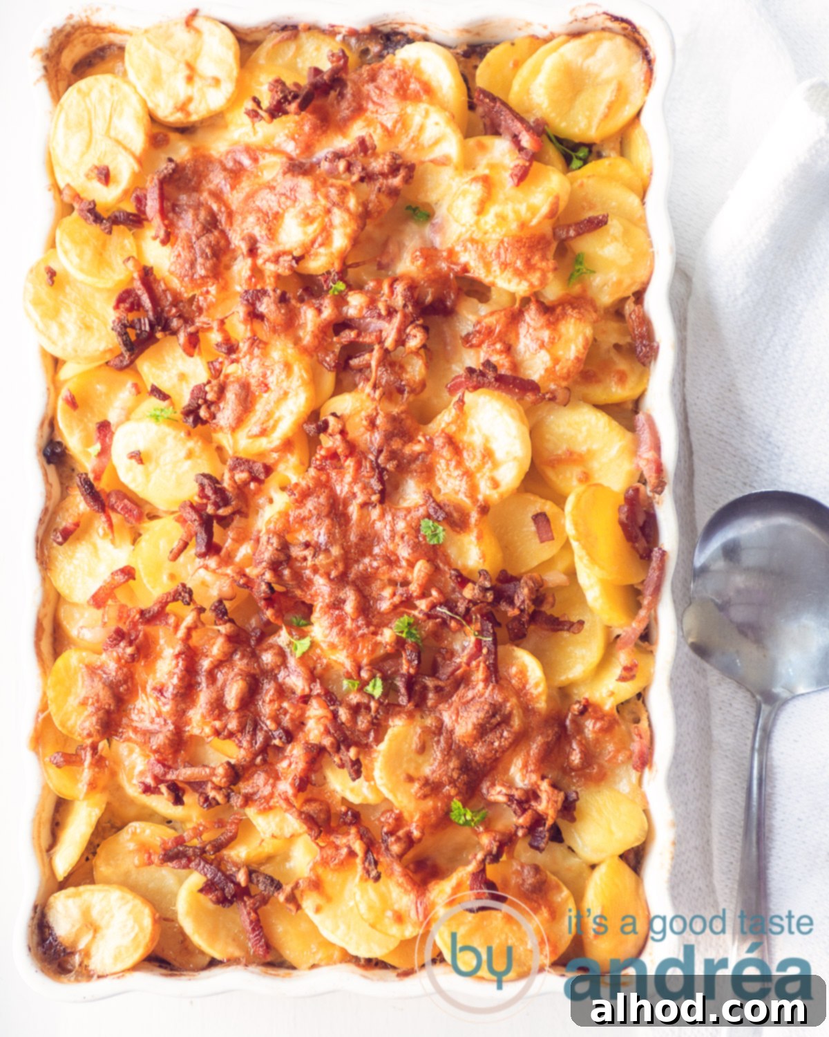Hearty Escarole and Potato Gratin with Bacon 5 part of a Escarole casserole with a spoon