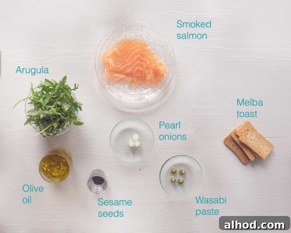 Arugula Infused Salmon Morsels 3 Ingredients Christmas amuse bouche salmon in arugula oil on a white background with text description
