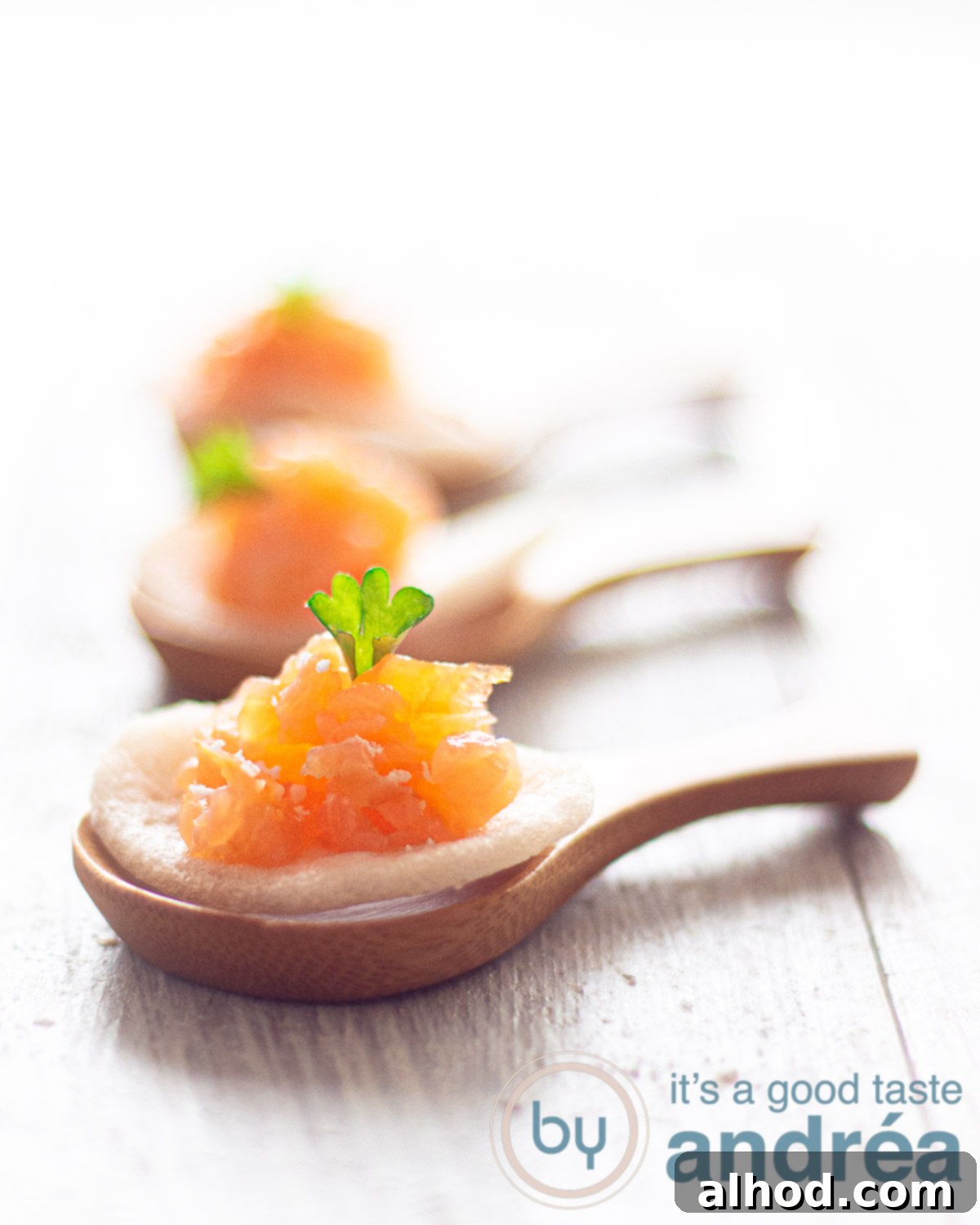 Salmon Prawn Cracker Bites 5 three bamboo spoons topped with a prawn cracker with smoked salmon