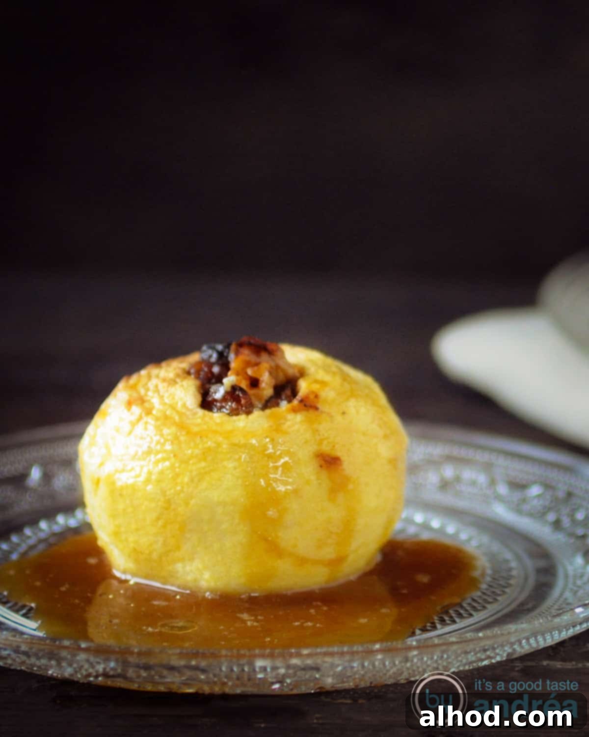 Delicious and easy baked apples with a walnut and raisin filling, ready to be served.