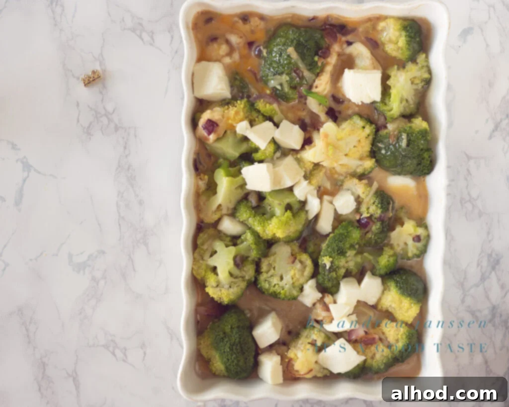 Herby Broccoli Frittata with Melted Mozzarella 6 Step 4: Topping the frittata with remaining mozzarella before baking.