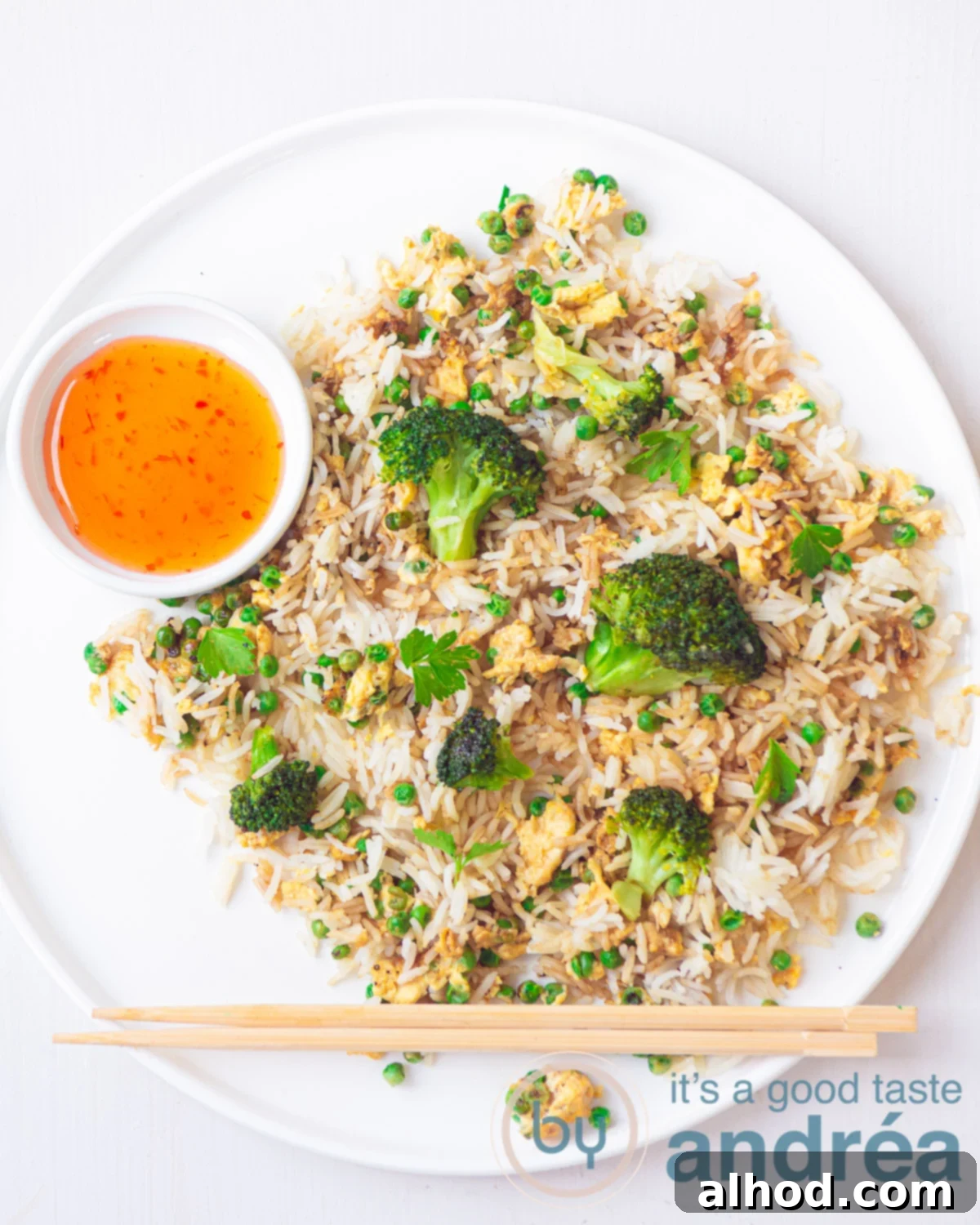Velvety Egg and Vibrant Broccoli Fried Rice 5 Close-up of a serving of delicious Broccoli and Egg Fried Rice, showcasing the fluffy rice grains, bright green broccoli, and golden egg strips, inviting you to take a bite.