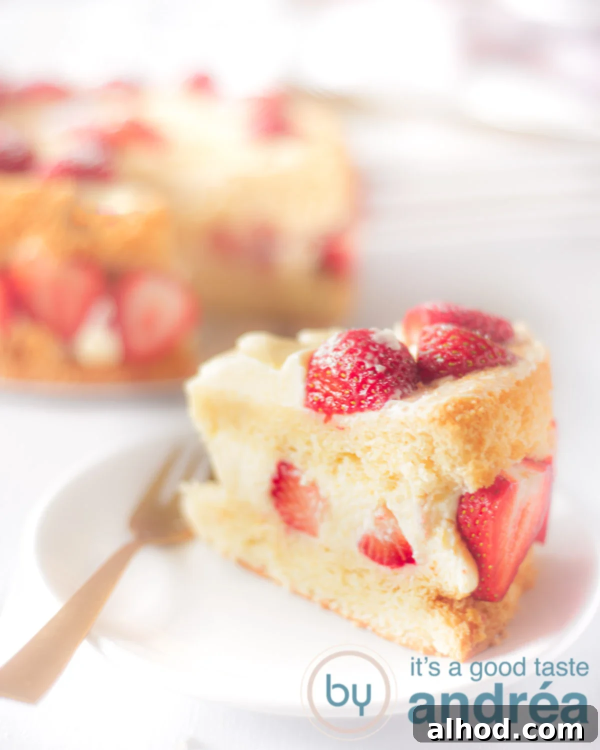 Cloud-Soft Strawberry Chiffon 7 Strawberry chiffon cake part on a cake spoon