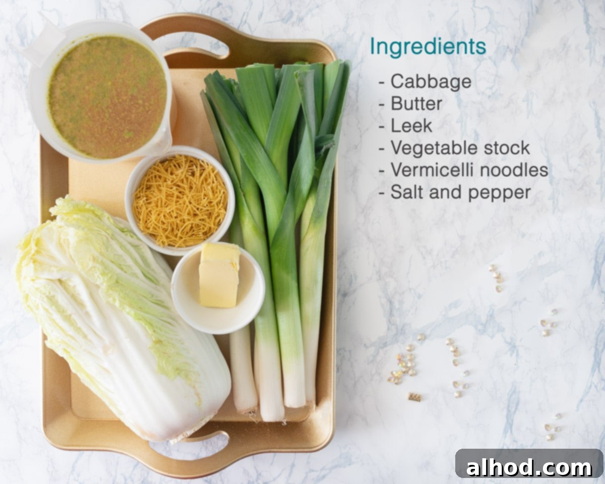 Hearty Vegetarian Cabbage Leek Soup 3 Ingredients Vegetarian Cabbage and Leek Soup on the left on a golden plate. To the right a text overlay with the ingredients.