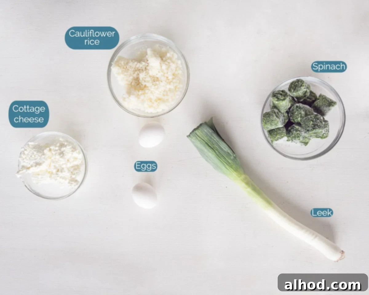 Silky Cauliflower Risotto with Fresh Spinach and Leeks 3 Individual ingredients for Creamy Cauliflower Rice with Spinach and Leek, including cauliflower rice, sliced leek, fresh spinach, eggs, cottage cheese, butter, salt, and pepper, all laid out on a white background.