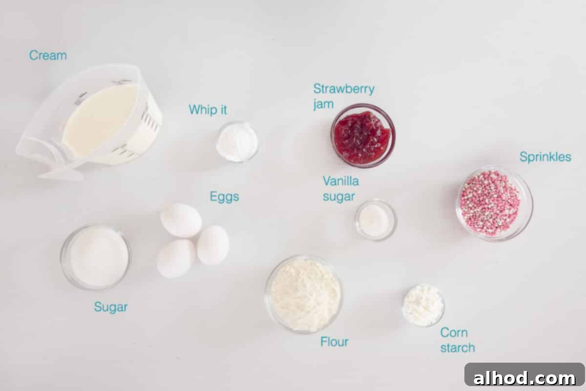 Baby Shower Swiss Roll 3 Individual ingredients for a Baby Shower Cake Roll, neatly arranged and labeled on a pristine white background, ready for baking.
