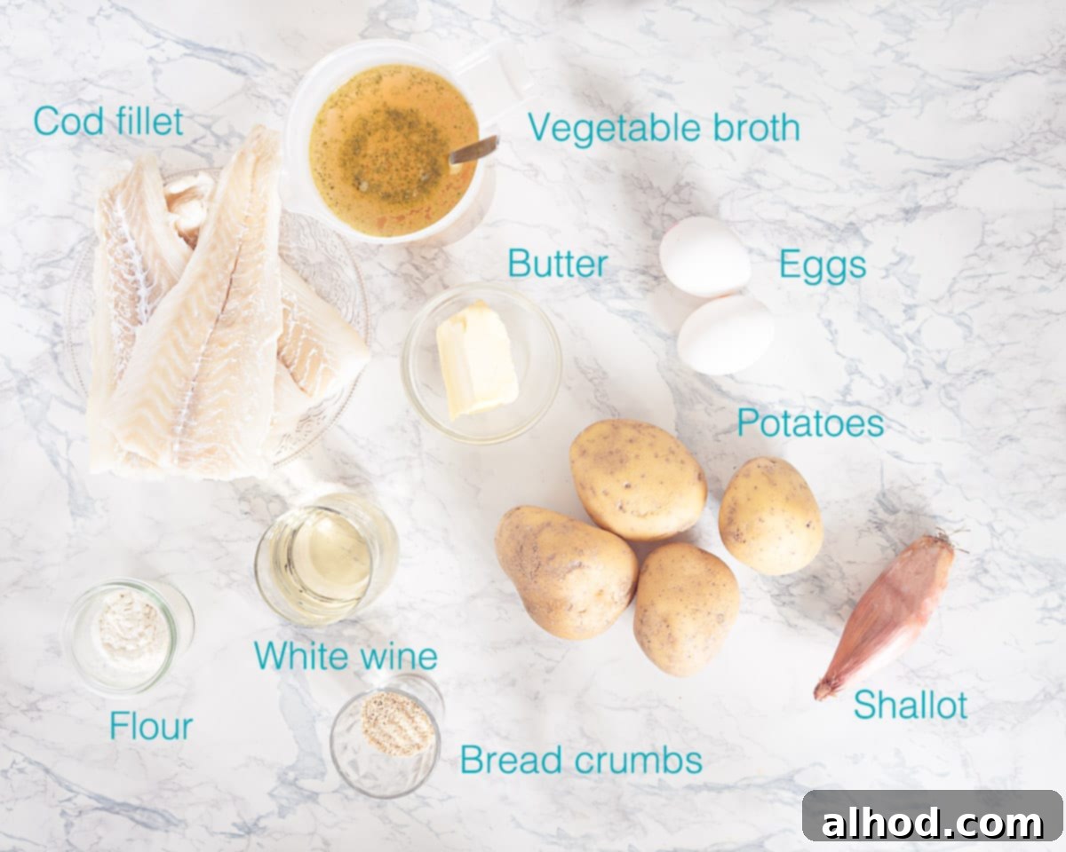 Hearty Cod and Potato Bake 3 A selection of fresh ingredients laid out, including cod fillets, potatoes, white wine, butter, flour, and shallots, for the cod and potato casserole.
