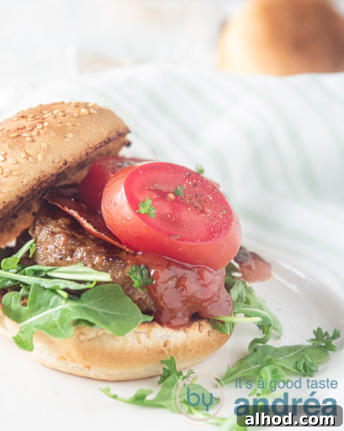 Luxe Bun Burger 2 Hamburger with a bun the luxe on a wooden board