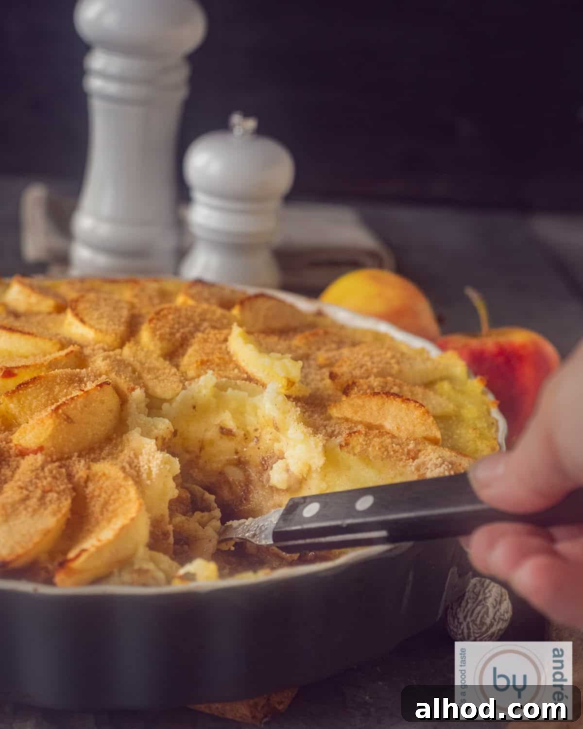 Meltingly Tender Dutch Rump Pot Roast 2 A height photo of a quiche dish filled with Dutch jachtschotel with apples. A bite has been taken out of it