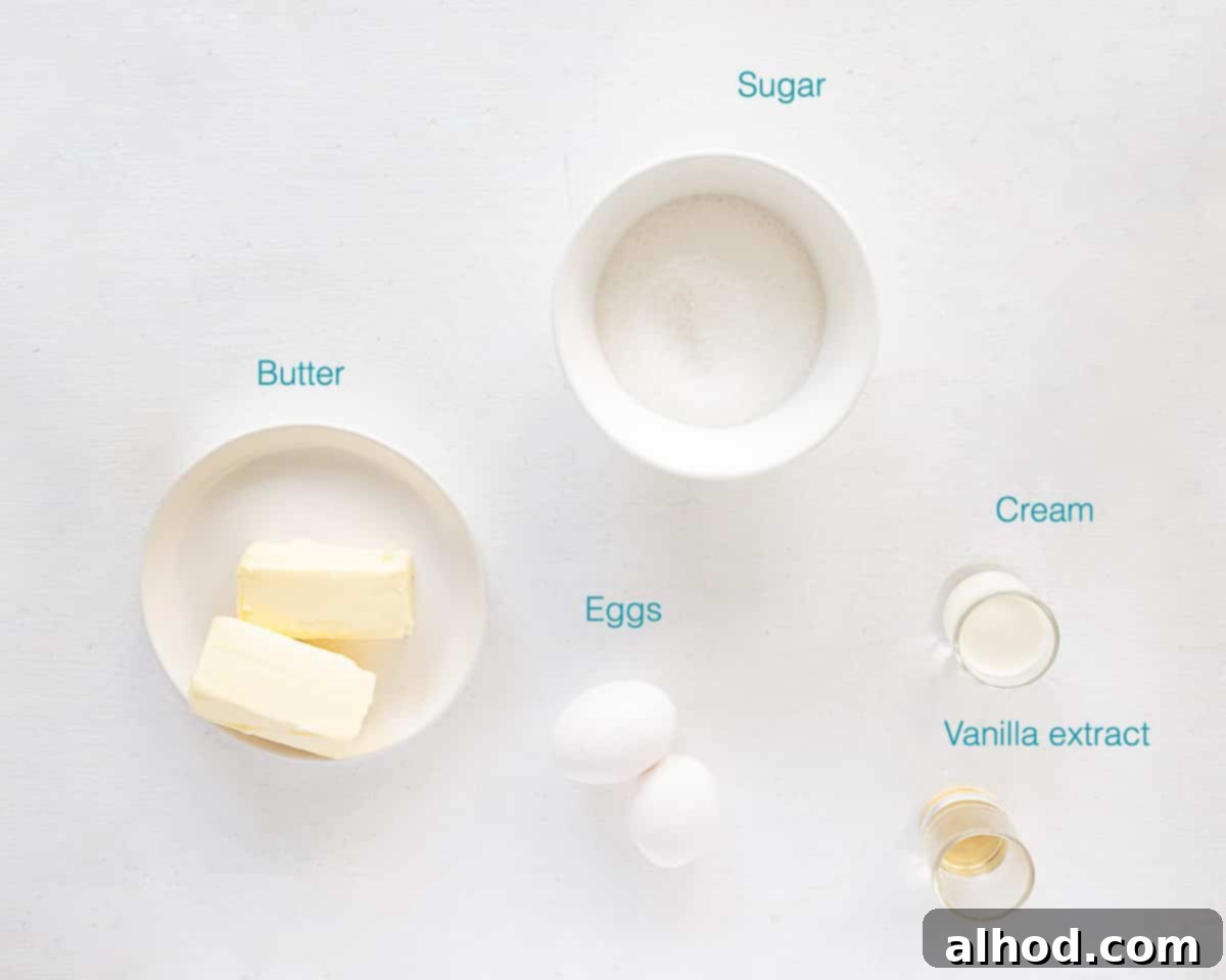 Ingredients for creamy caramel buttercream, including sugar, cream, butter, and vanilla, arranged on a white surface.