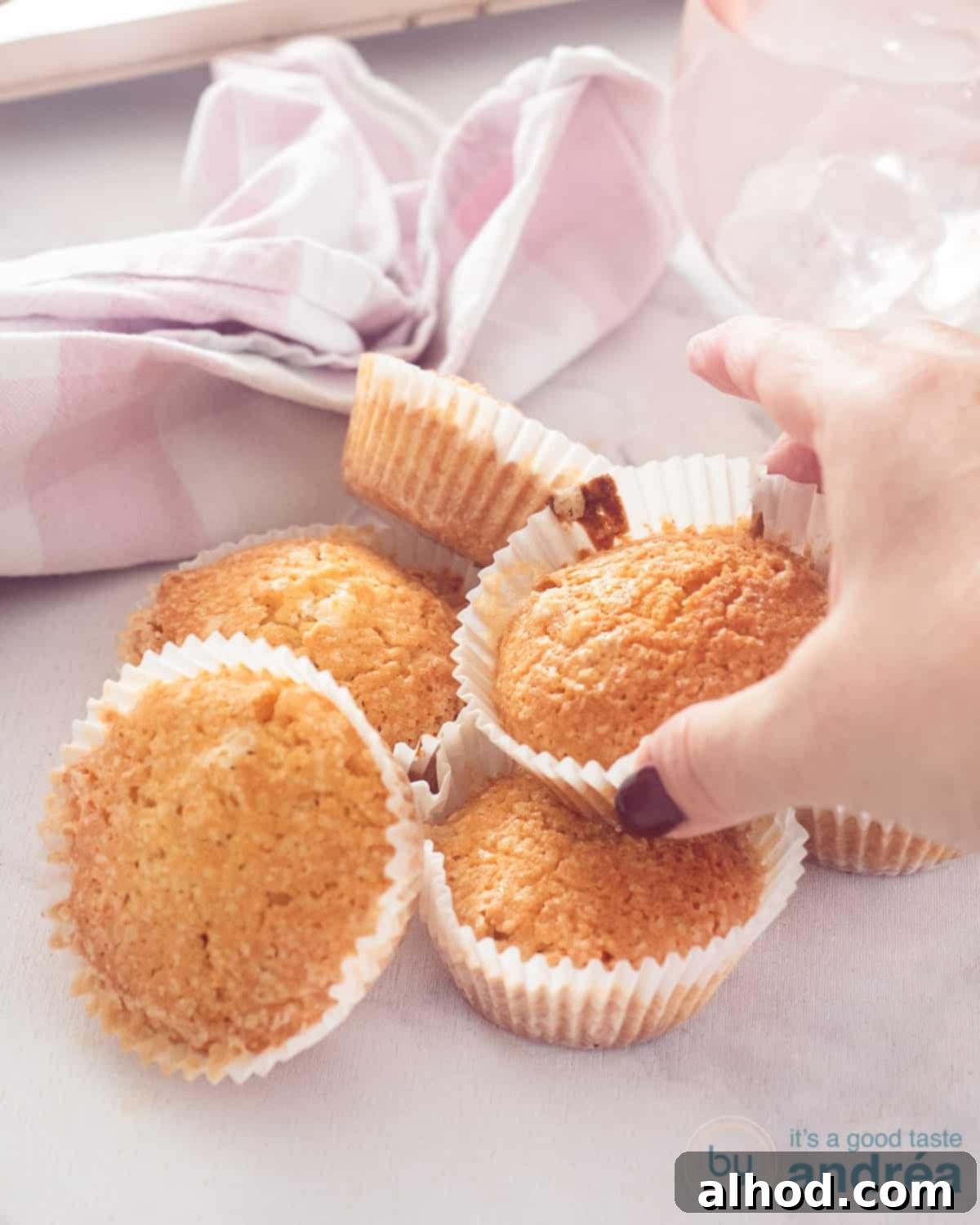 Sparkling Pearl Sugar Muffins 2 Delicious Pearl sugar muffins with a golden-brown top, ready to eat.