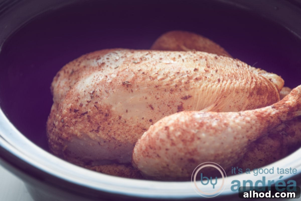 Easy Slow Cooker Rotisserie Chicken 5 a chicken in a crockpot