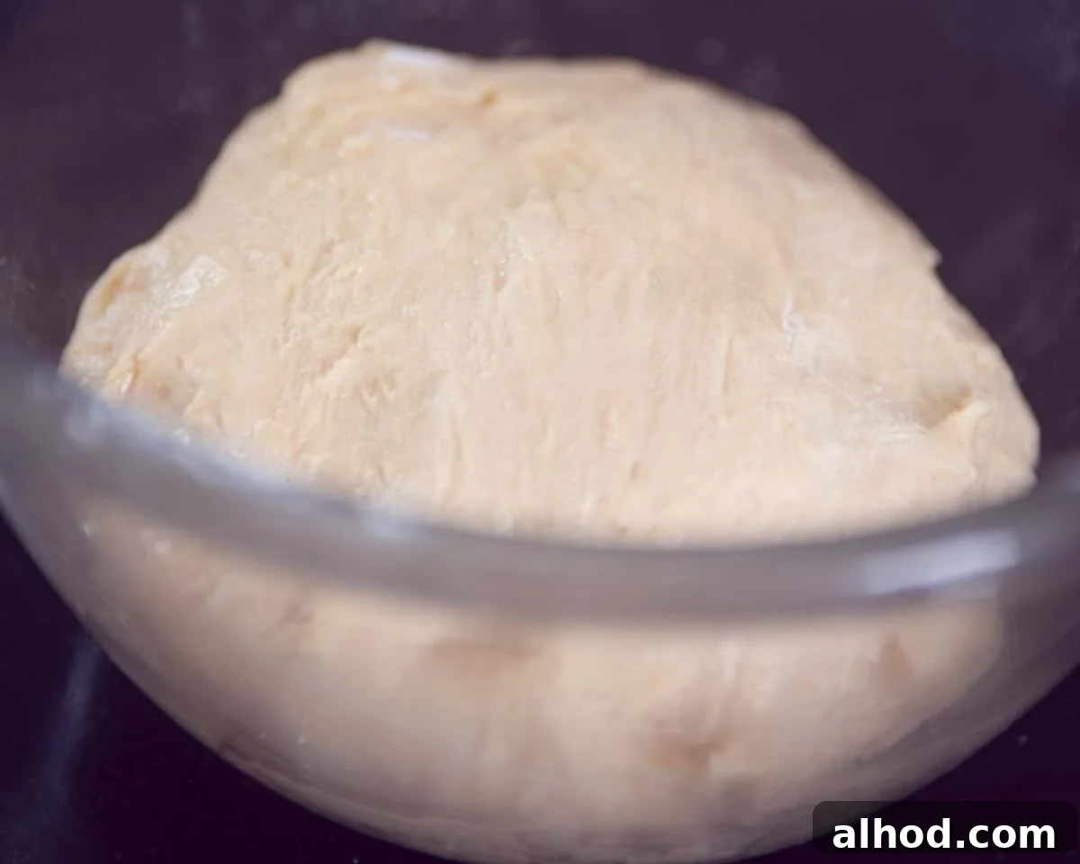 Starry Cinnamon Pull-Apart Bread 3 A glass bowl filled with dough