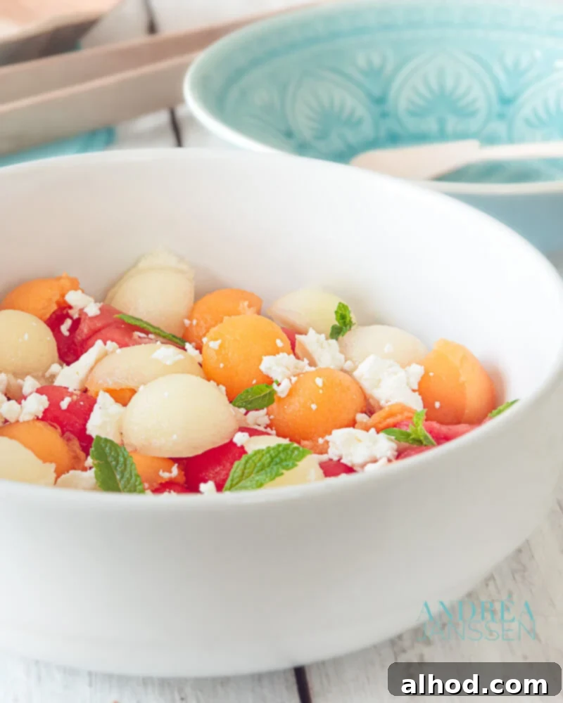 Three colors melon salad with goat cheese and mint