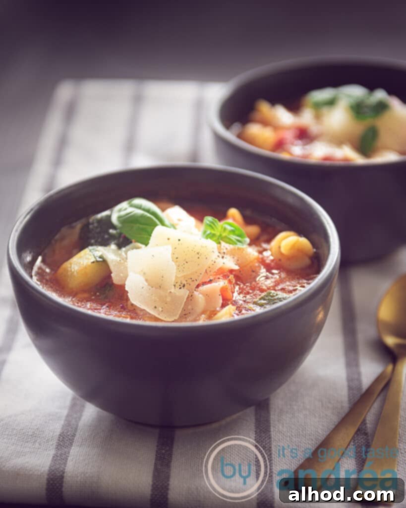 two cups of Filled minestrone soup with pasta