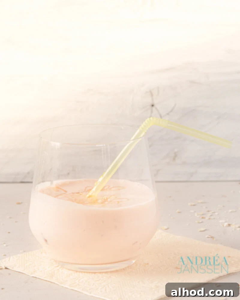 Sun-Kissed Oat & Tangerine Blend 3 Oatmeal Tangerine Smoothie in a glass