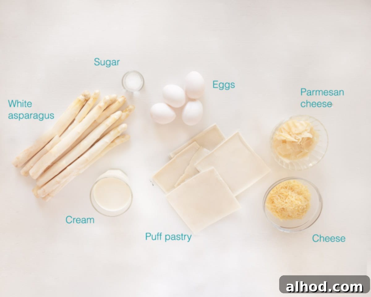 Vegetarian White Asparagus Quiche 3 Ingredients for a Vegetarian White Asparagus Quiche laid out on a white background with text overlay
