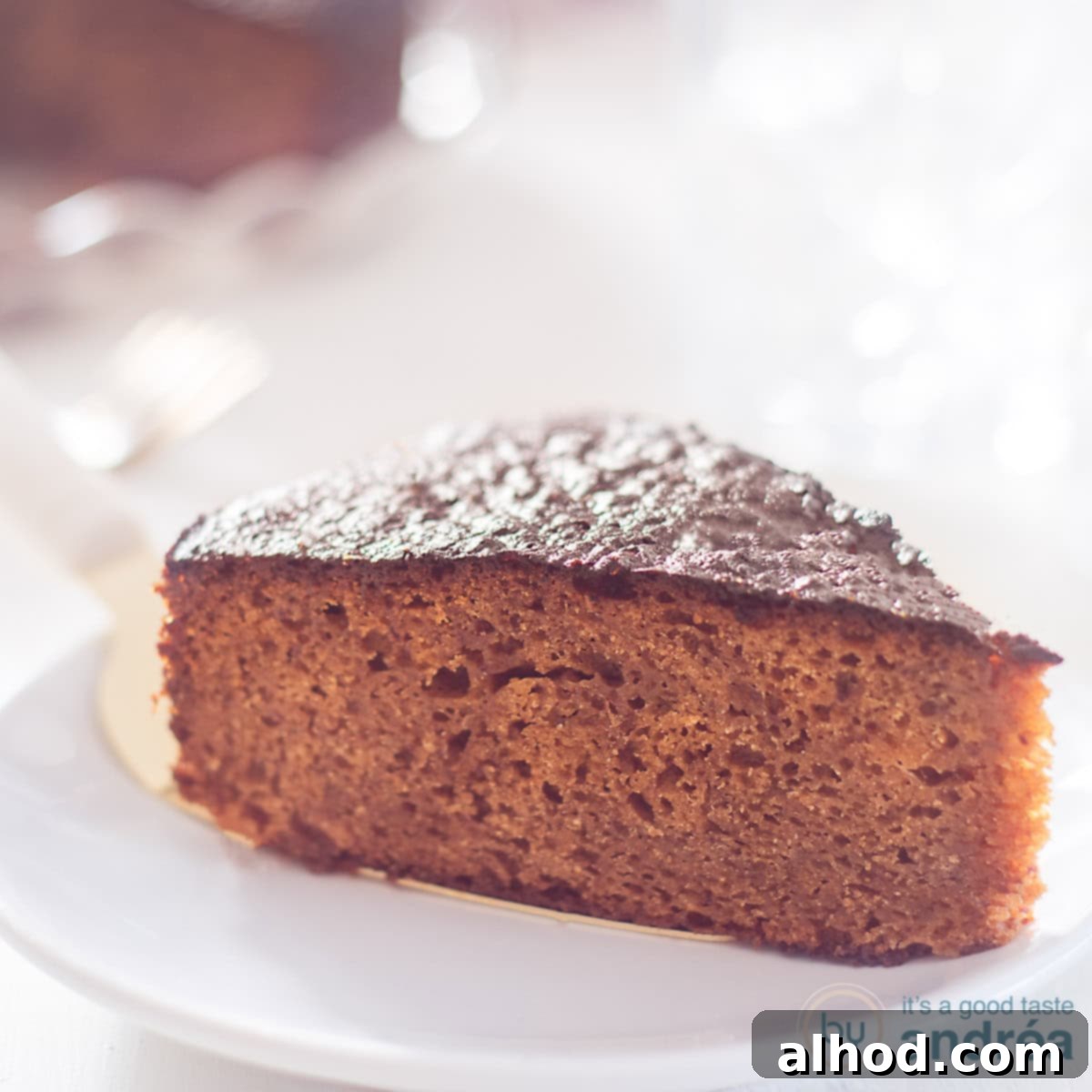 Melt In Your Mouth Sticky Toffee Cake 4 A square picture of a piece of sticky date cake, perfect for a classic British dessert recipe