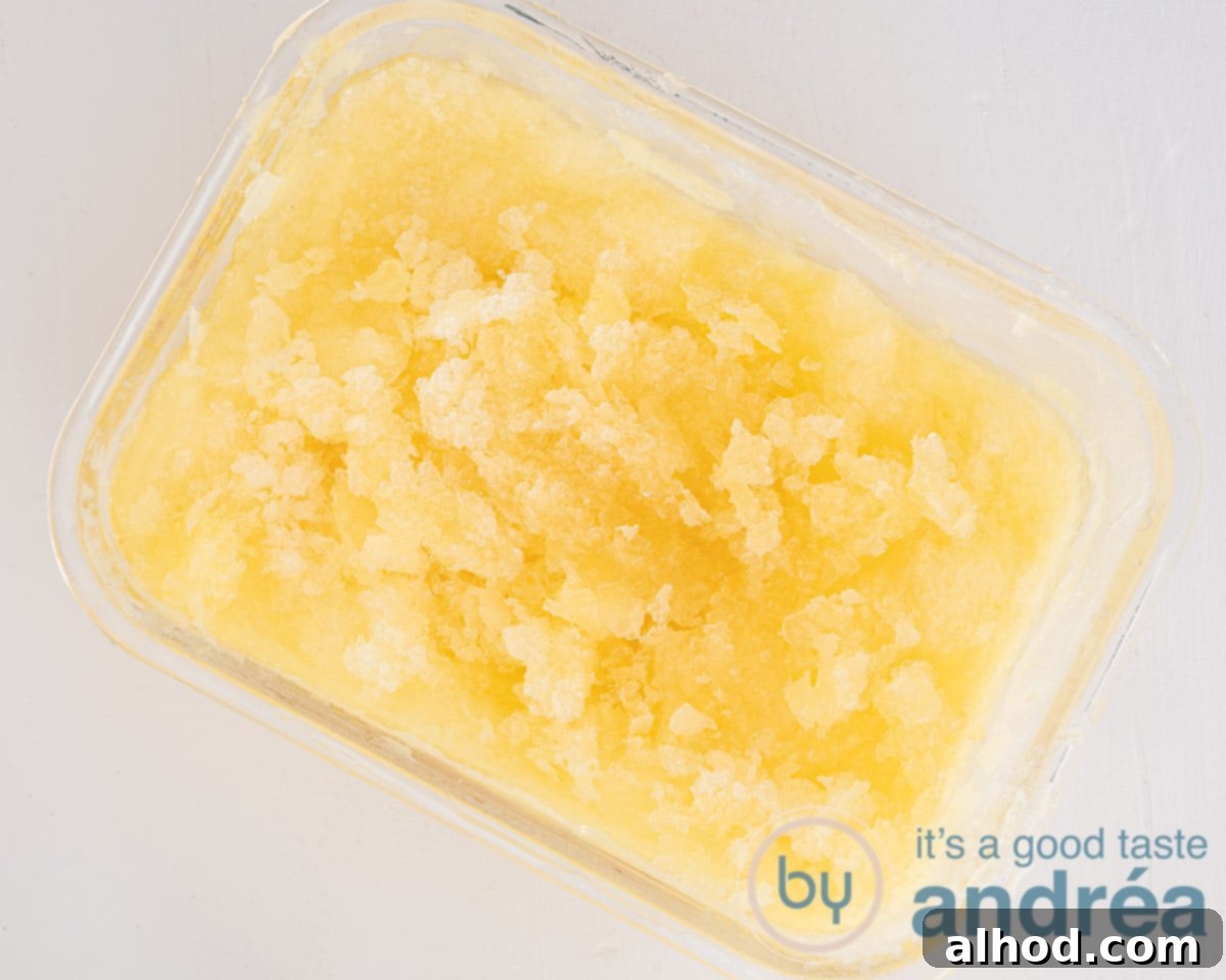 Hoppy Frost 5 A photo from above of a freezer box filled with beer ice cream with orange.