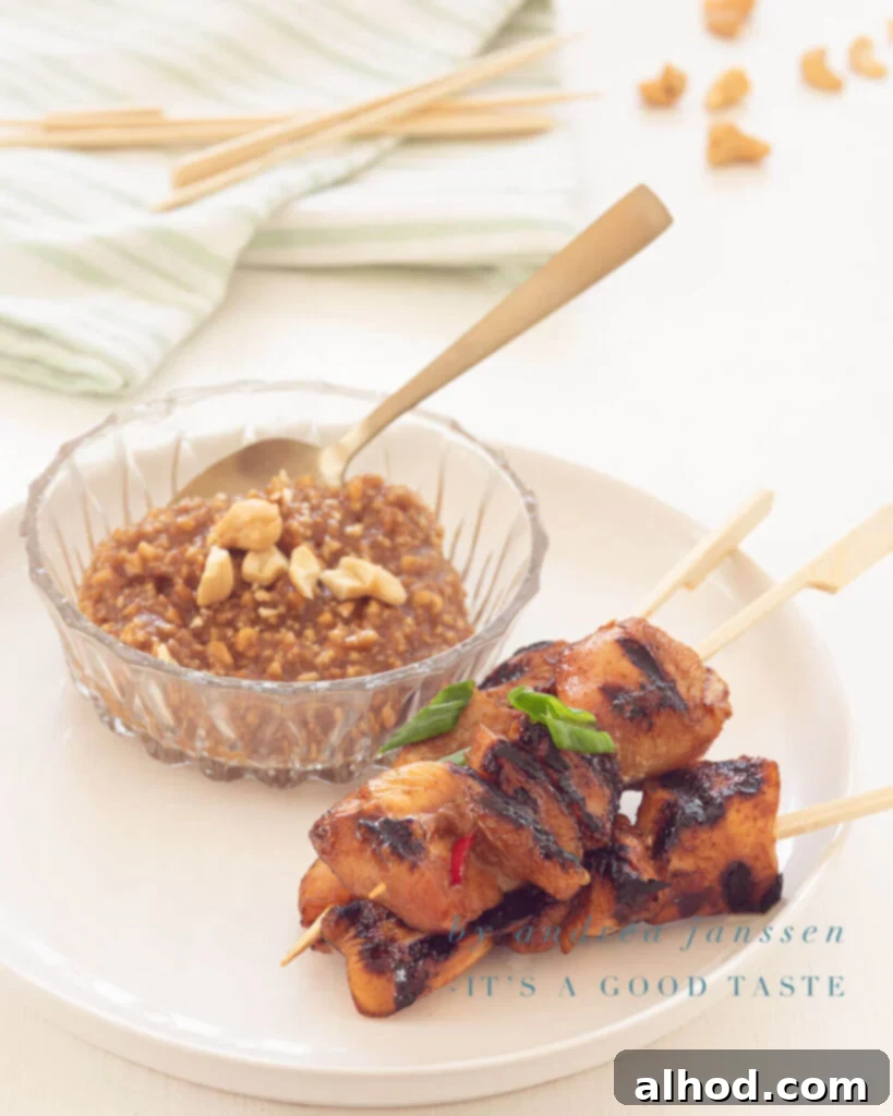 Grilled pork tenderloin satay with peanut sauce