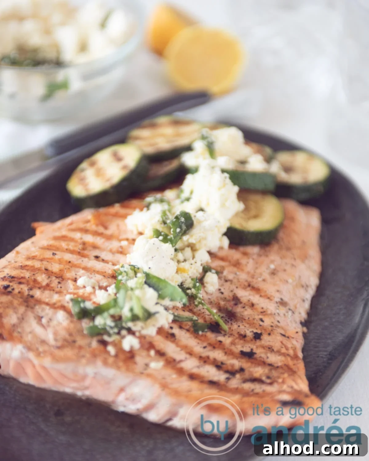 Grilled Salmon & Zucchini Delight 5 a large salmon, grilled and zucchini with a feta dressing on top