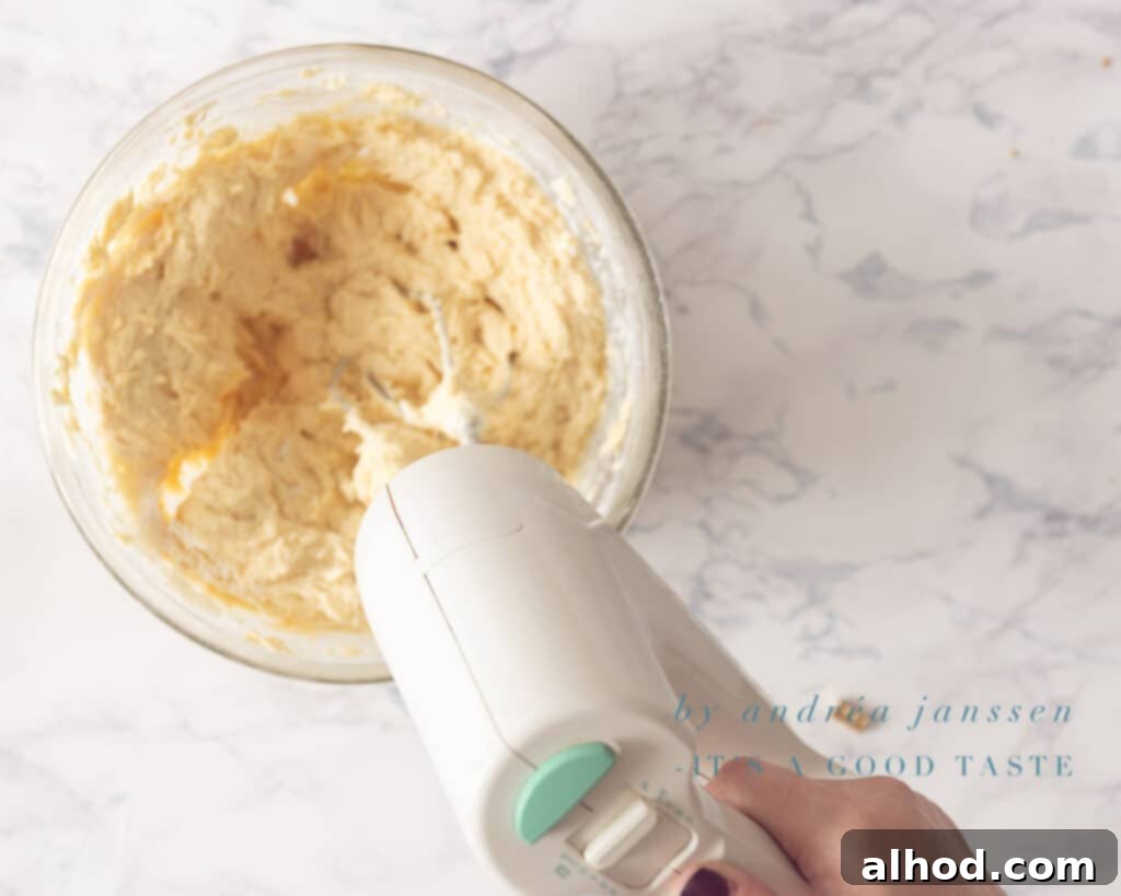 Dreamy Strawberry Ricotta Cake 4 Mixing butter and sugar until light and fluffy for the cake batter.