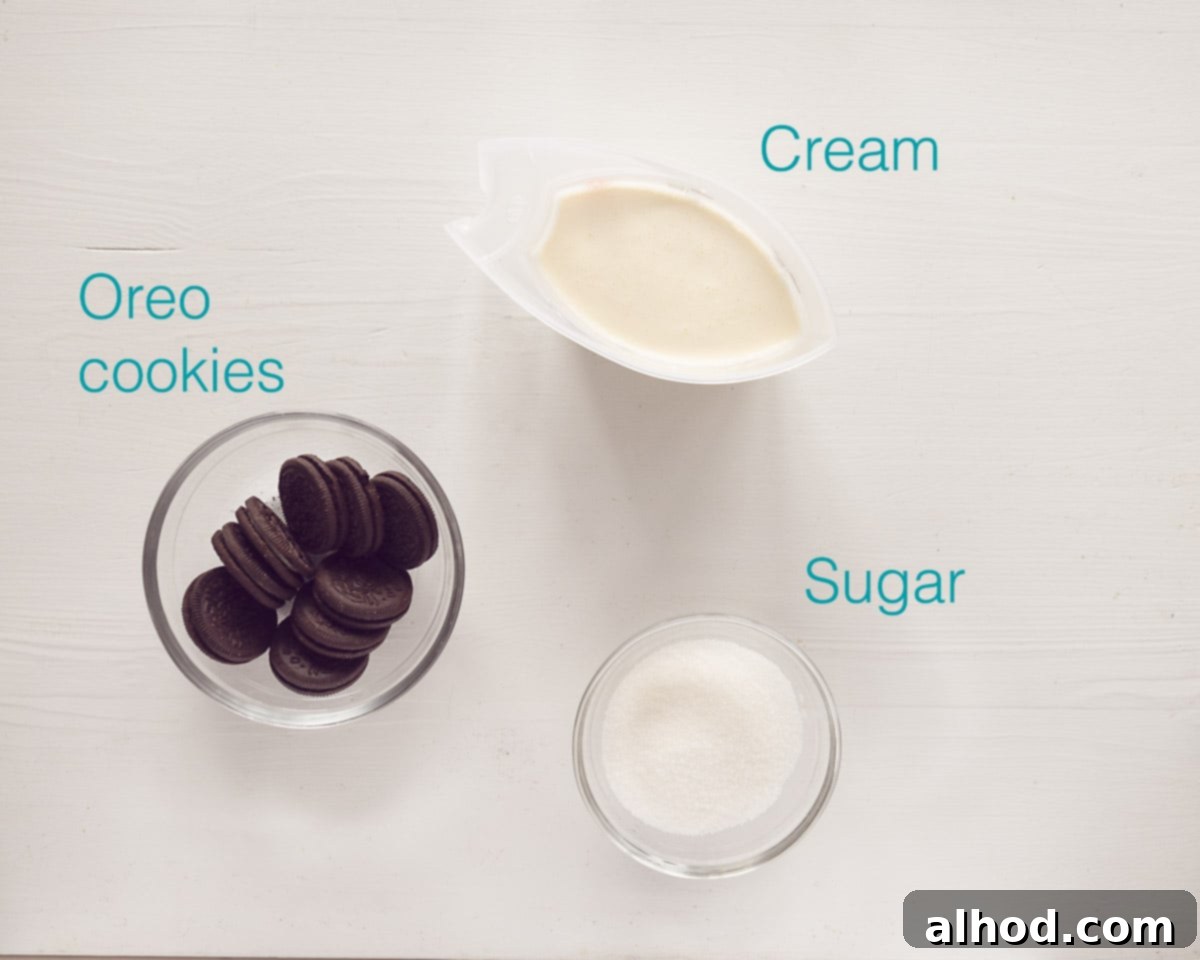 Creamy Egg-Free No-Churn Oreo Gelato 3 A flat lay image displaying the three simple ingredients for no-churn Oreo ice cream: a bag of Oreo cookies, a carton of heavy cream, and a bowl of granulated sugar, all on a white background with a text overlay.
