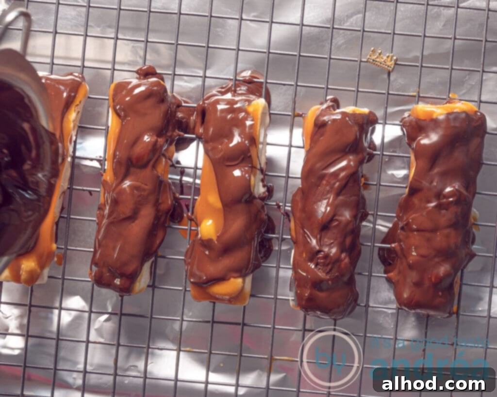 Ultimate Homemade Snickers 7 Cover your bars with chocolate